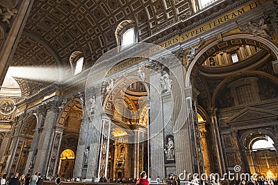 Interior of Saint Peters basilica with a ray of light from the window Editorial Stock Photo
