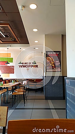 Interior of a shop of the fast food chain BURGER KING. originally called Insta Burger King Editorial Stock Photo