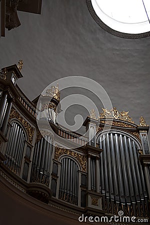 Organ in a church in Finland with oculus and curves Stock Photo