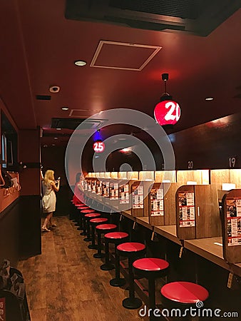 Interior shot of Ichiran Ramen. Ichiran is a Japanese ramen food-service business specializing in tonkotsu ramen Editorial Stock Photo