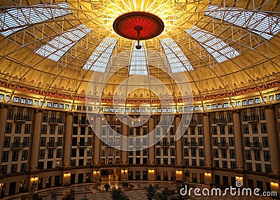 Interior shot of a majestic dome-shaped ceiling with multiple light fixtures Editorial Stock Photo