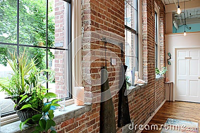 Interior shot of old historic brick building with large airy windows, Adirondack Salt Caves, Glens Falls, New York, 2018 Editorial Stock Photo