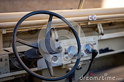 Interior shot of an vintage Land Rover, focusing on the steering wheel Editorial Stock Photo