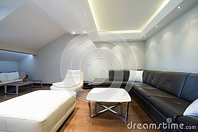 Interior of a spacious luxury living room with colorful ceiling Stock Photo