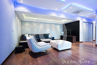 Interior of a spacious luxury living room with colorful ceiling Stock Photo