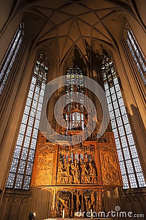 Interior of St. James Church in Rothenburg Ob der Tauber, wooden behind the altar the image of the ` Holy Blood`. Bavaria, Editorial Stock Photo