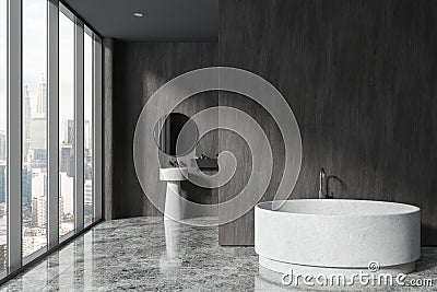 Gray bathroom interior with round bathtub and sink Stock Photo