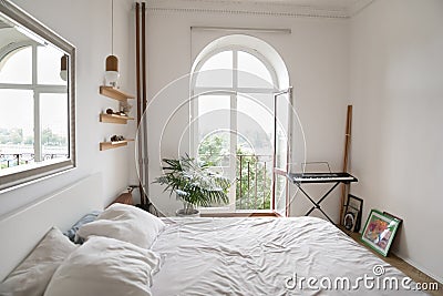 Interior of stylish, cosy modern empty bedroom Stock Photo