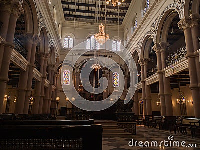 Interior of a synagogue with bimah in middle. Synagogue is Jewish house of worship for the purpose of Jewish prayer, study, Editorial Stock Photo