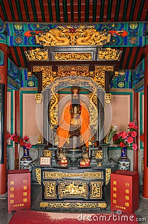 The interior of the Taoist Temple of the White Cloud, numerous decorations at the altar Stock Photo