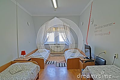 Interior of the triple hotel room in light tones Stock Photo