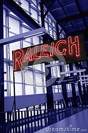 The interior of Union Station train depot in Raleigh, NC, with a neon Raleigh sign Editorial Stock Photo