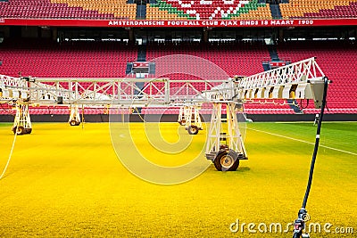 Interior view of Amsterdam Ajax Football Arena. System of care and sprinkling of the lawn at the stadium Editorial Stock Photo