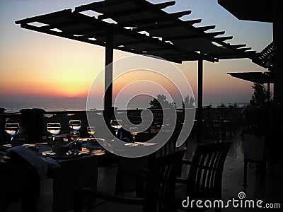 Interior view of the bar-restaurant at sunset. Sea and beautiful sunset. The image of the open terrace of the restaurant Stock Photo