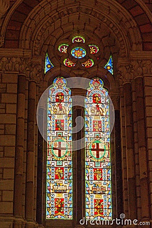 Interior view of famous stained glass windows of CSMT or VT a UNESCO world Heritage Editorial Stock Photo