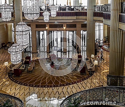 Interior view of a luxurious hotel, modern light chandelier in the hall Editorial Stock Photo