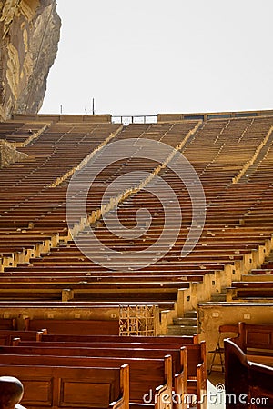 interior view of the rows of seats inside the old church of Saint Simon Stock Photo