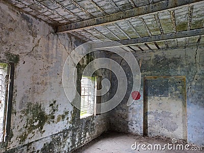 interior view of ruins of a building in poorly maintained condition Stock Photo