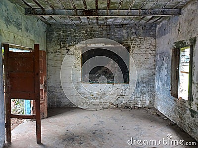 interior view of ruins of a building in poorly maintained condition Stock Photo