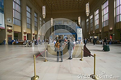 Interior view of 30th Street Station and ticket booths, a national Register of Historic Places, AMTRAK Train Station in Editorial Stock Photo