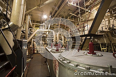 Steam engine room equipment in Liberty Ship Editorial Stock Photo
