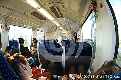Interior wagon with passengers Editorial Stock Photo