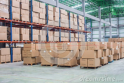 Interior of warehouse. Rows of shelves with boxes Stock Photo