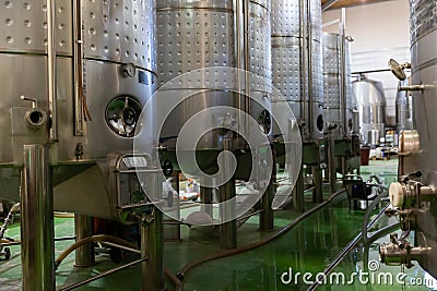 Interior of winery with stainless steel tanks Stock Photo