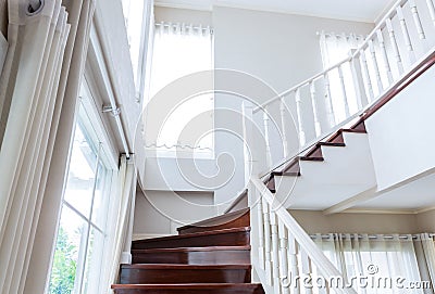 Interior wood stairs and handrail on background Stock Photo