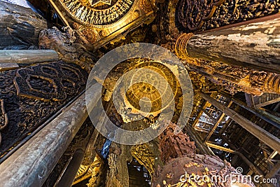 Interior of a wooden Buddhist temple Stock Photo