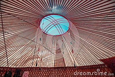 Interior of a Yurt. It is portable tent house in the culture of Central Asian nomadic peoples. Ethnic and folk patterns for home Stock Photo