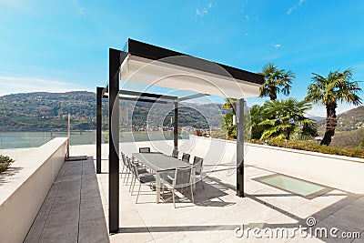 Interiors, beautiful veranda overlooking the lake Stock Photo