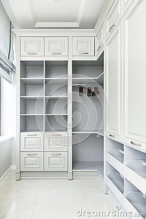 The interiors of the cottage: a large white wardrobe Stock Photo