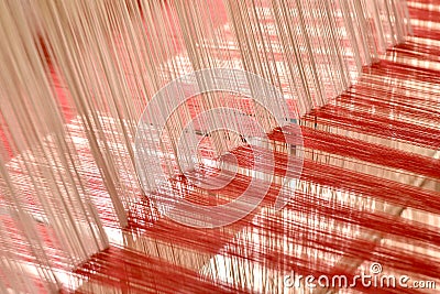Abstract of cotton thread interlacing on the loom. Stock Photo