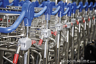 Interlocked Luggage Carts, close-up Stock Photo