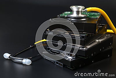 Internal SATA type hard disk drive and stethoscope with copy space on black background for protect data, repair, fixed, service an Stock Photo