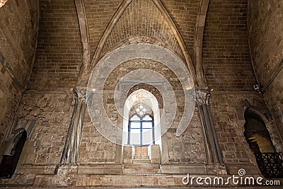 Internal wall with arches, columns and windows of the Catel del Monte di Andria Italy Editorial Stock Photo