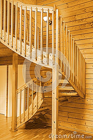Internal wooden spiral staircase Stock Photo
