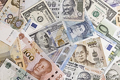 International banknotes from world major countries using as Fore Editorial Stock Photo