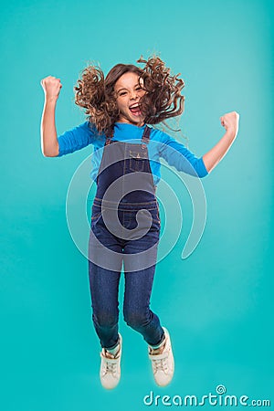 International childrens day. small kid fashion. small girl child with perfect hair. Happy little girl. Beauty and Stock Photo