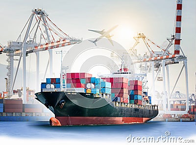 International Container Cargo ship with ports crane bridge in harbor Stock Photo