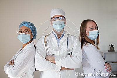 International doctor team. Hospital medical staff. Mixed race Asian and Caucasian doctor and nurse meeting. Coronavirus outbreak. Stock Photo