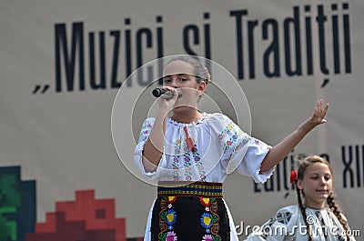 International Folklore Festival: Romanian girl singer Editorial Stock Photo