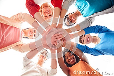 International group of women with hands together Stock Photo