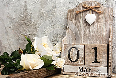 International Labor Day 1st may date card with flowers Stock Photo