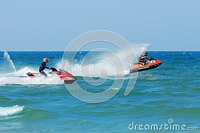 International and local PWC riders in racing actions. Editorial Stock Photo