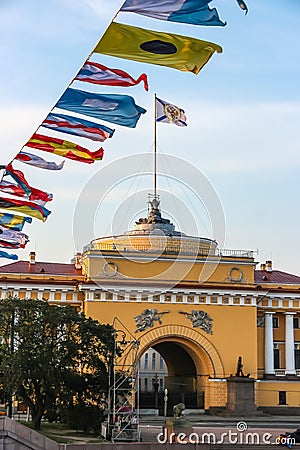 International maritime signal flags are waving on wind under blue cloudy sky Editorial Stock Photo