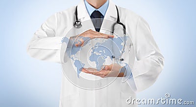 International medical coverage insurance concept, hands doctor covering world map symbol on white background, copy space Stock Photo