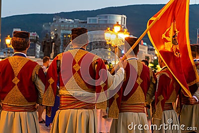International parade in the streets of Skopje, Macedonia with traditional costume folk dress. Ready to dance in the festival. Big Editorial Stock Photo