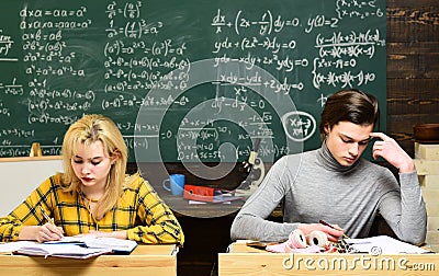 International student making individual online testing and writing composition for annual exams. Professional tutors are Stock Photo